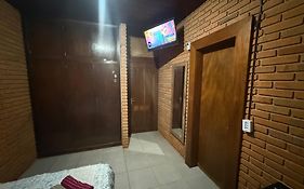 Quarto com banheiro privativo no Centro